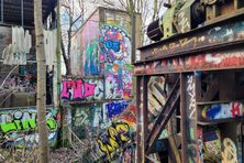 Graffiti on the exterior walls and the conveyor belt