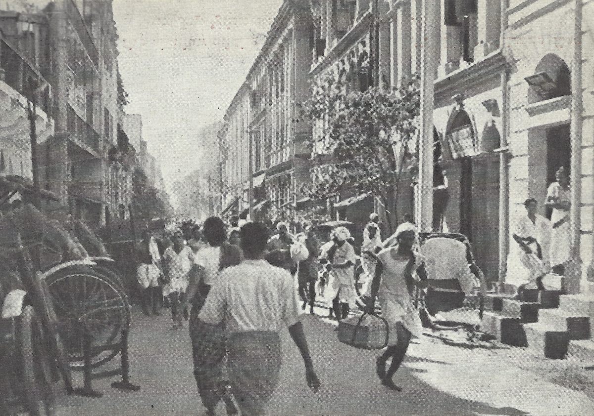 Many Burmese Indians fled the Japanese invasion of Burma. Here, ethnic Indians leave 39th Street in Rangoon (now Yangon), the capital of Burma, in December 1941.