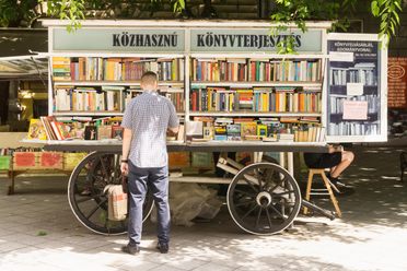 Thousands of mobile bookstores, such as this cart in Budapest, Hungary, make it easier than ever to pick up books while on the road—but that doesn't make choosing one any easier!