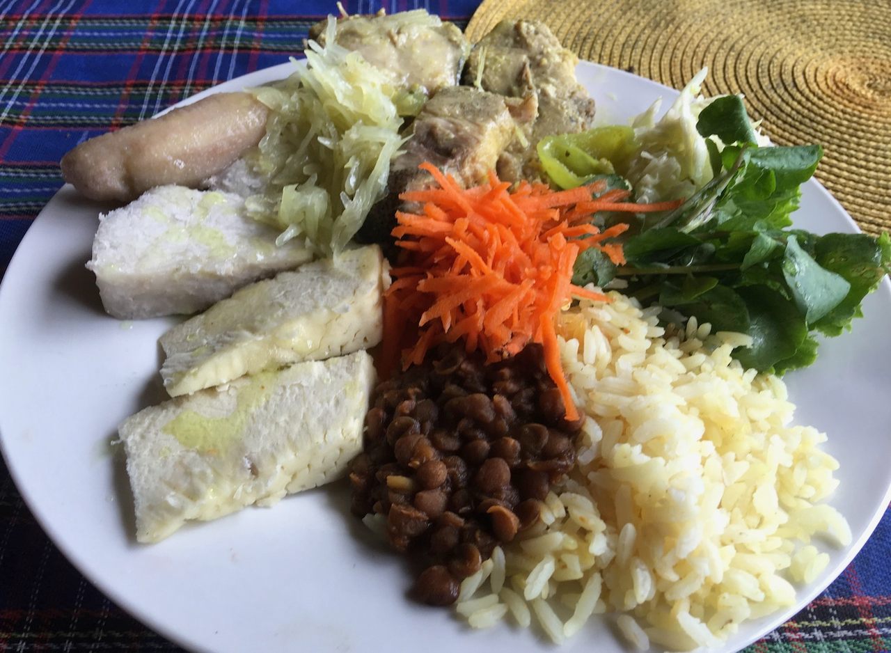 A traditional meal of fish and provisions (tubers and vegetables) served on the Caribbean island of Dominica.
