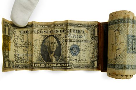 This short snorter belonged to Tom Farrow, a member of the 384th Bomb Squadron taken prisoner in Germany during World War II. These 19 bills are a snapshot of his experience in the war.