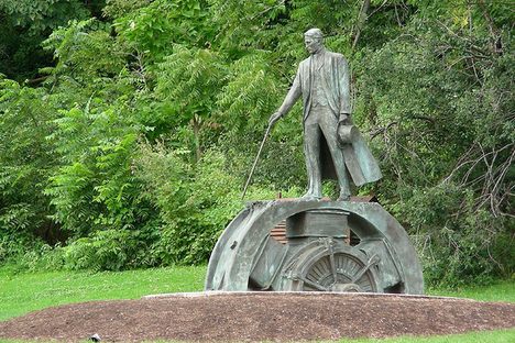 Tesla looks out from on top of one of his inventions.