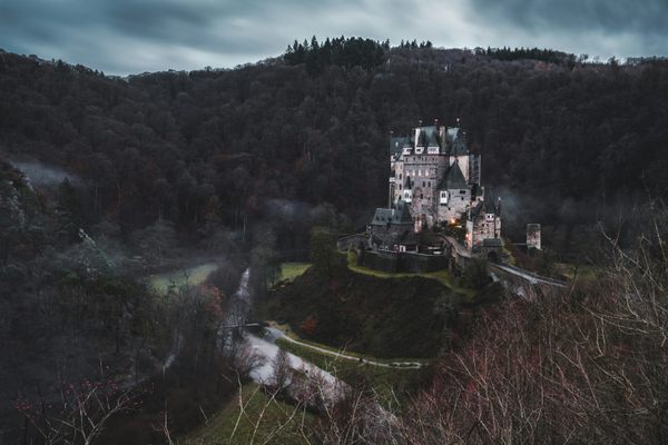 Emerging from the wintry fog in all its grandeur, this 80-room castle has remained in the same family for 33 generations