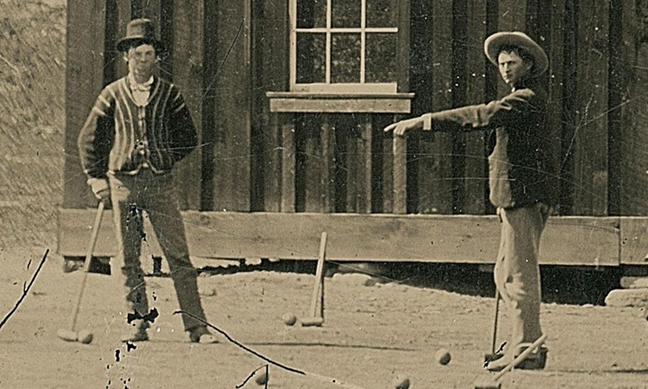 One of two confirmed photographs of Billy the Kid (left), playing croquet in New Mexico, 1878.