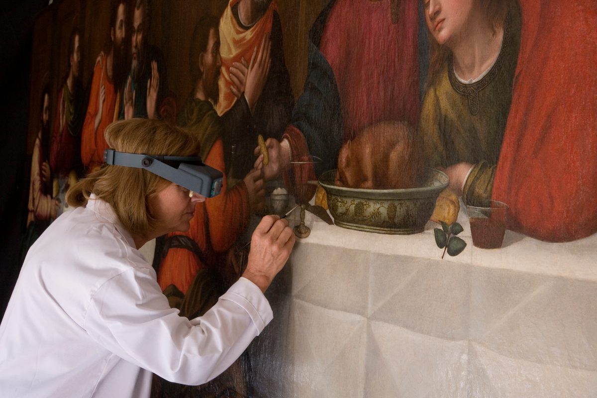 Conservator Rossella Lari, putting the finishing touches on "Last Supper" by Plautilla Nelli.