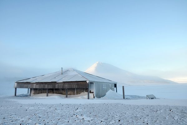 Robert Falcon Scott’s 1902 Discovery Hut, at Hut Point, with Observation Hill in the background.