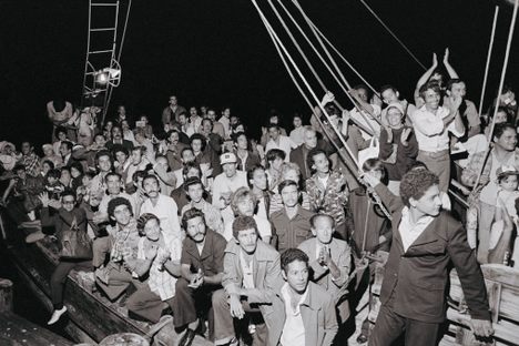 Cuban refugees wait for U.S. Immigration Service officials aboard the shrimp boat Big Babe at Key West, Florida.