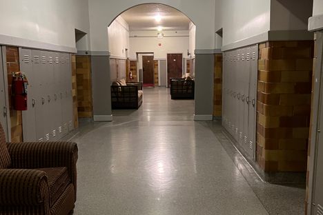 Hallway of Inn showing original terrazzo flooring and lockers.