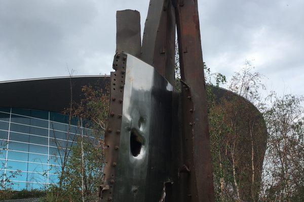 The SINCE 9/11 World Trade Center Artwork, with the London Aquatic Centre behind it.