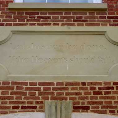 Inscription above the entrance to the courthouse.