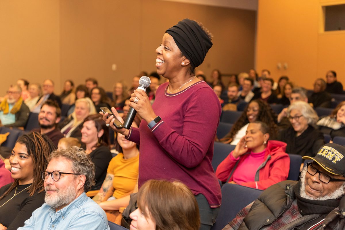 An audience member asks a question at Michael Twitty's 2019 Library of Virginia talk. His presentations on food history often spark intense reactions.