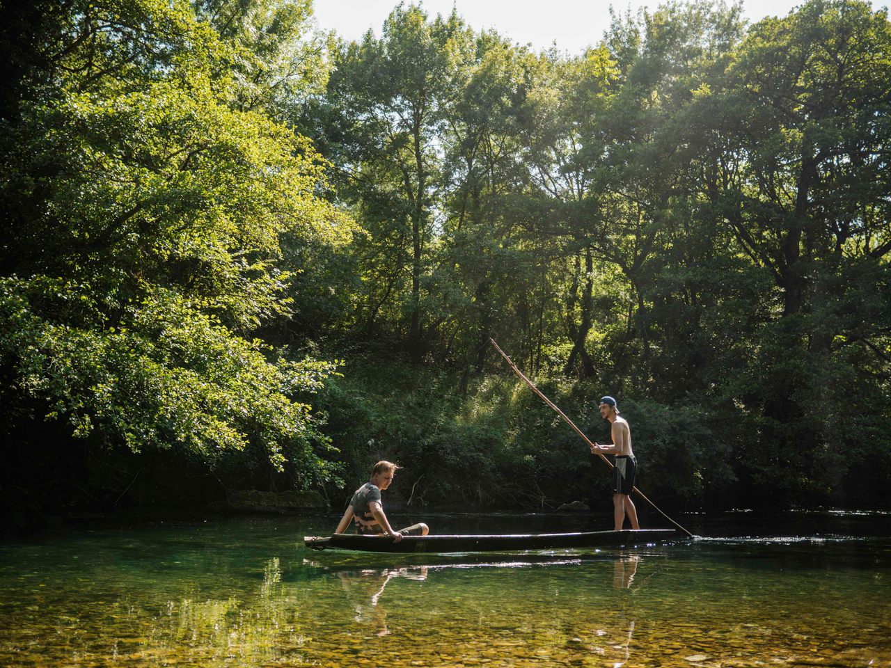 Taking a négo chin out on the cold, shallow waters of the Sorgues River offers respite from the Provençal summer's heat—nearly forgotten, the traditional wooden boats are enjoying a revival.