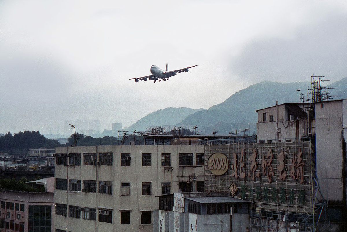A Cathay Pacific aircraft makes its final approach to Kai Tak, 1998.