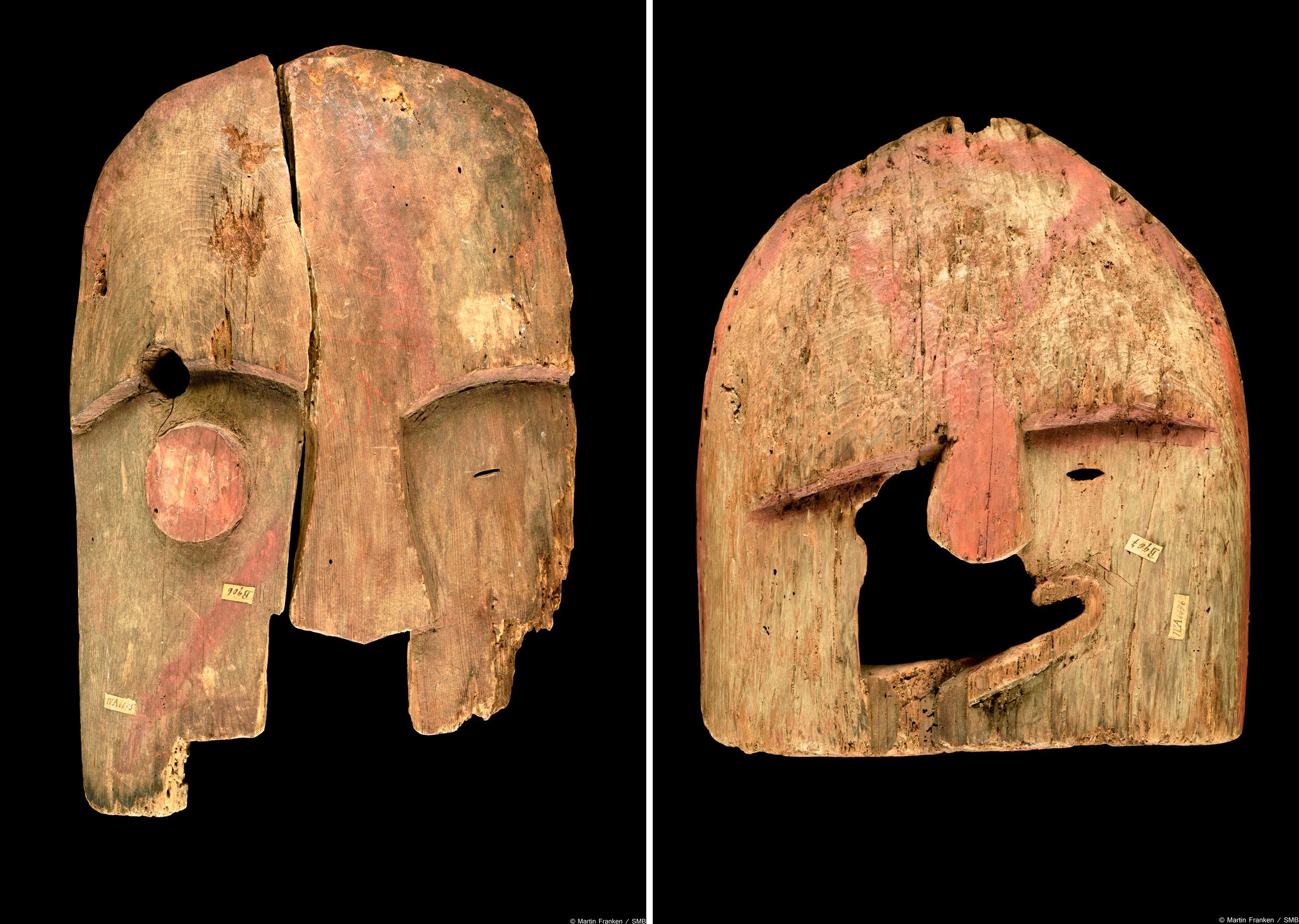 Two wooden Chugach masks.