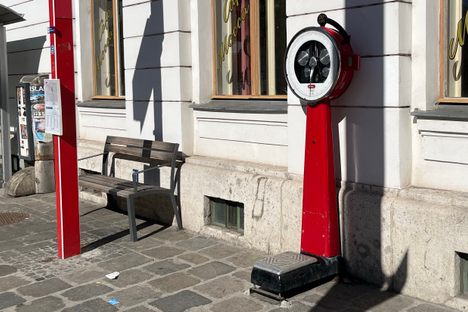 Scale at a bus stop.