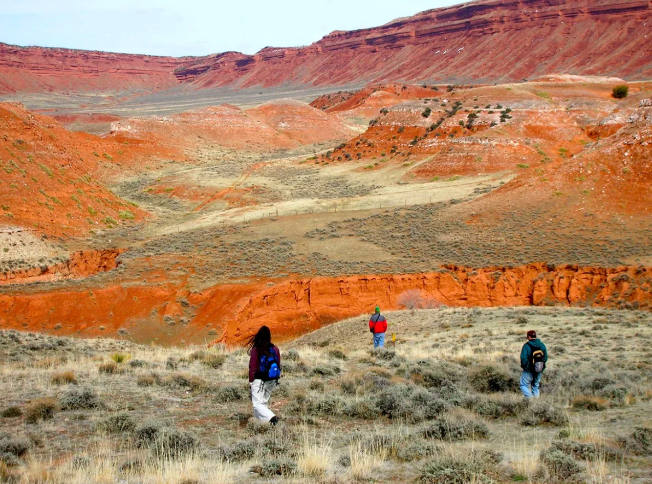 The area’s famous red wall is approximately 350 feet high and composed of red sandstone.