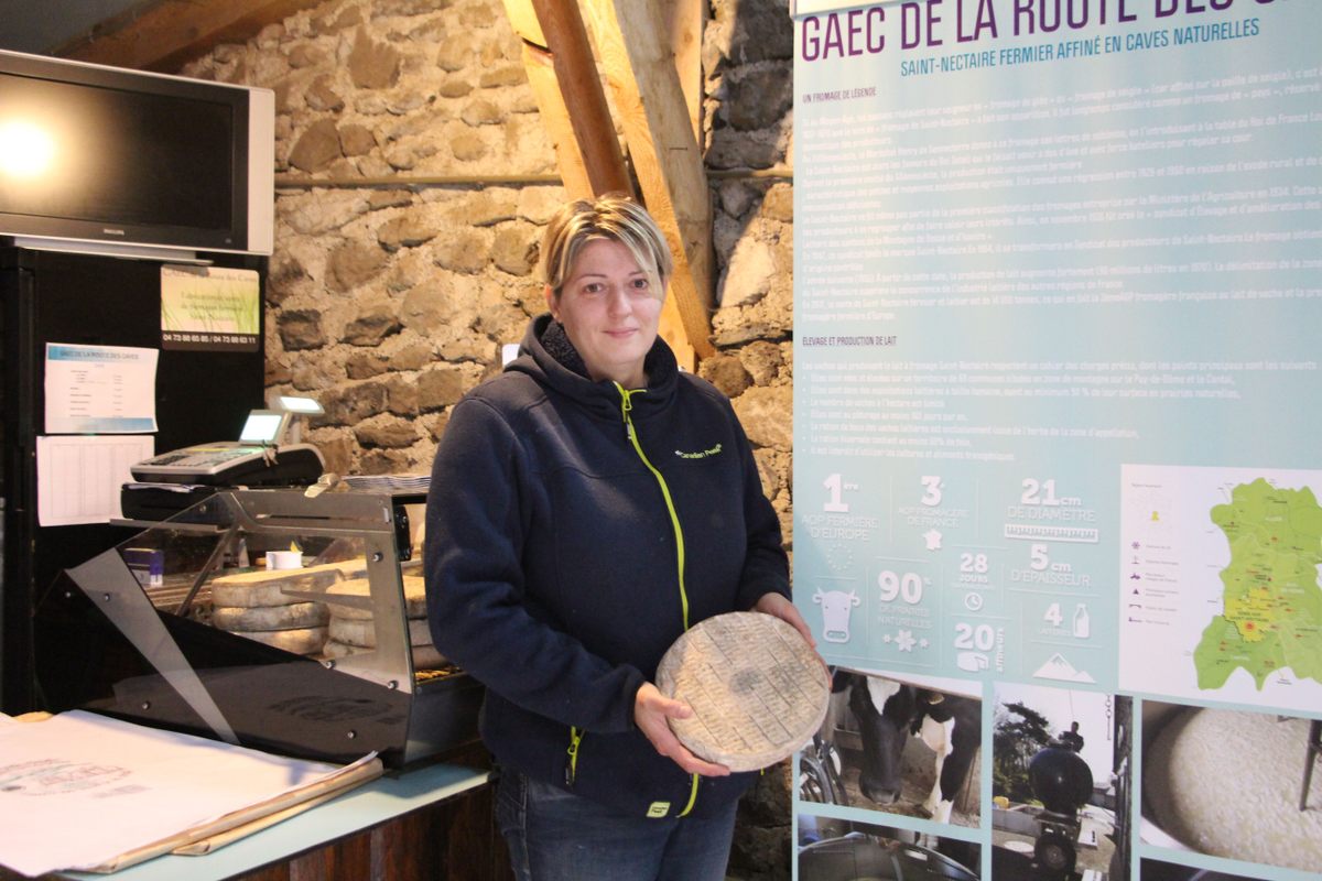 Caroline Borrell, along with a wheel of her Saint-Nectaire.