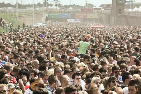 People innocently packed into the Love Parade 2010 venue just moments before a chaotic outbreak.