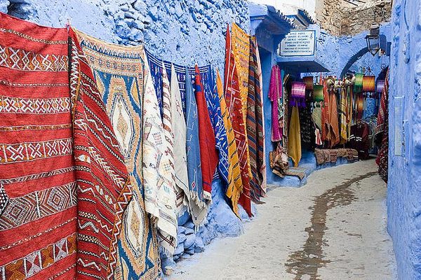 Items for sale in a blue alley in Chefchaouen. (magda-maciek/Flickr) 