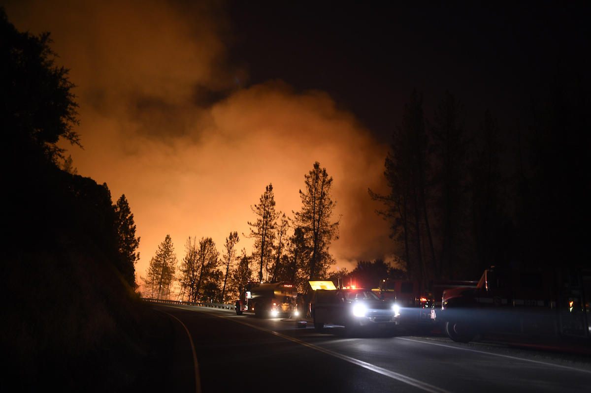 The Carr fire burns along Highway 299 between Whiskeytown and Redding, July 28, 2018.