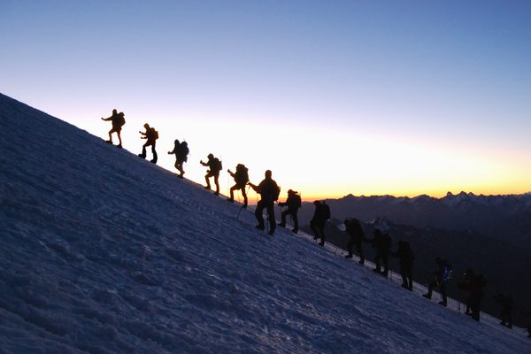 Climbers ascend Mount Elbrus.