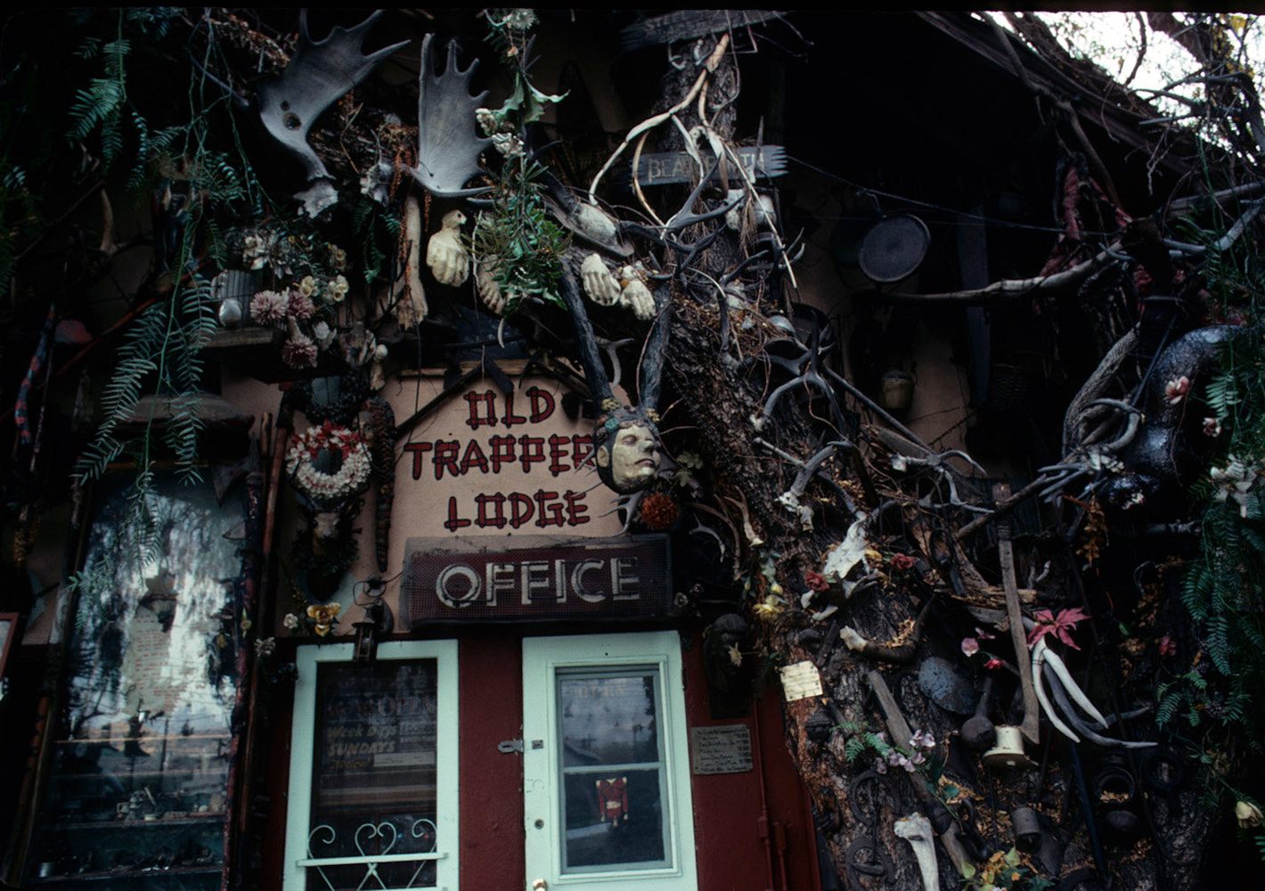 The statues originally stood in front of Old Trapper's Lodge. After artist John Ehn's death, the collection was designated a California Historic Landmark.