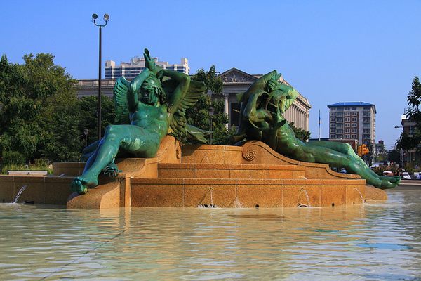 Sculpted figures lounge in the Swann Memorial Fountain