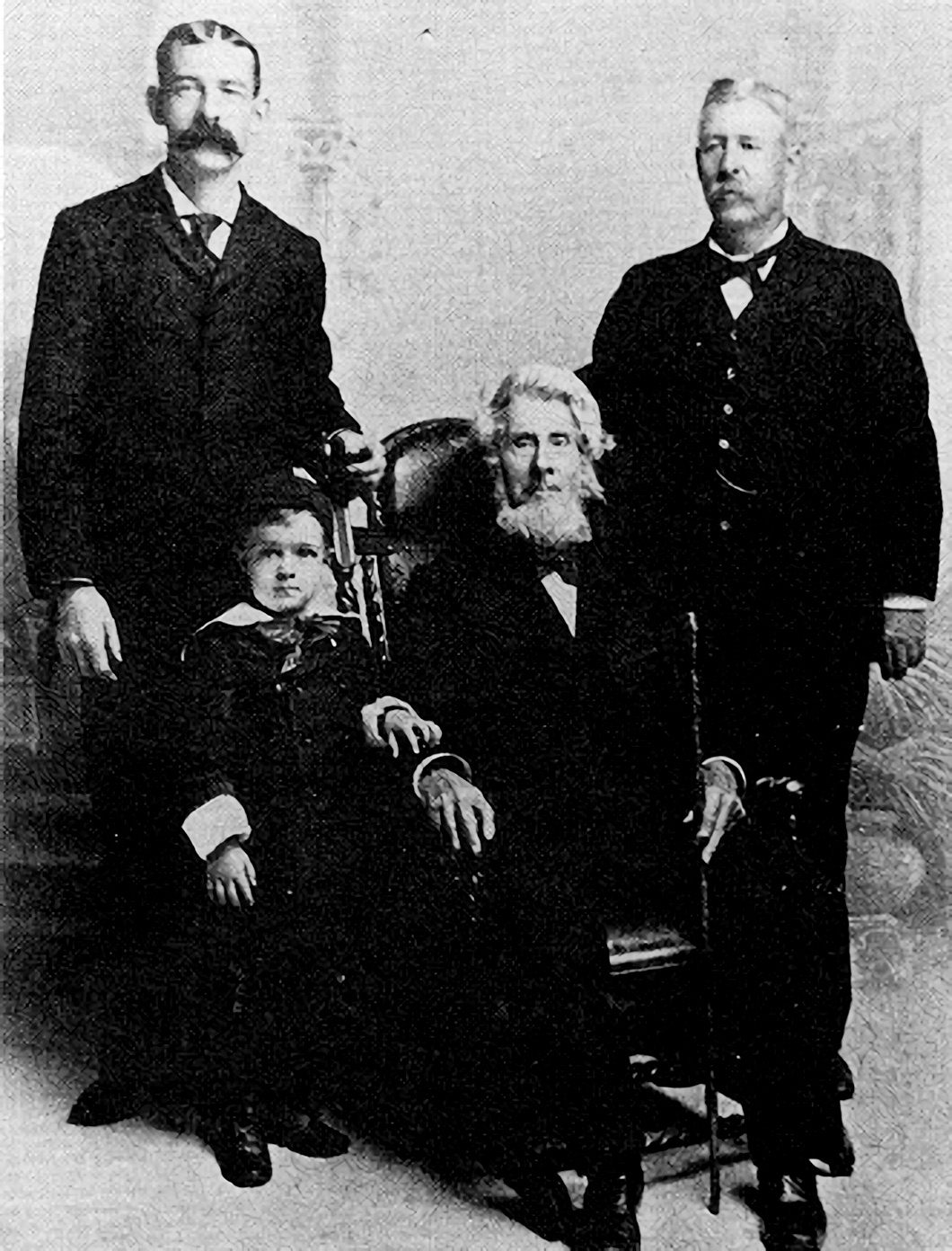 Four generations of Lowells, circa mid-1890s. The man seated is Hiram, grandson of founder Simeon Lowell.