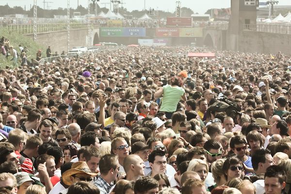 People innocently packed into the Love Parade 2010 venue just moments before a chaotic outbreak.