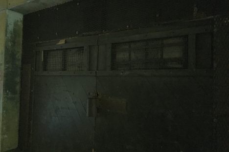 Locked access to the main interior and underground portions of the structure
