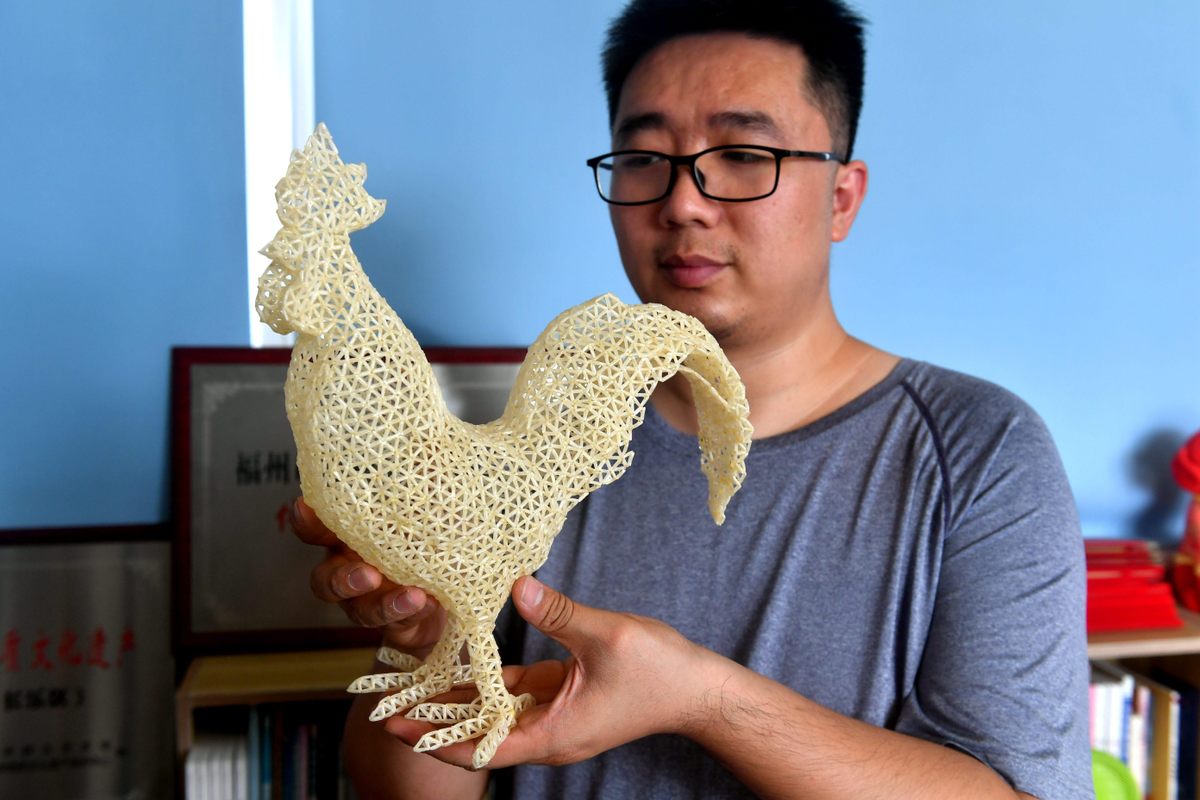 Guorui is most proud of his life-size rooster.
