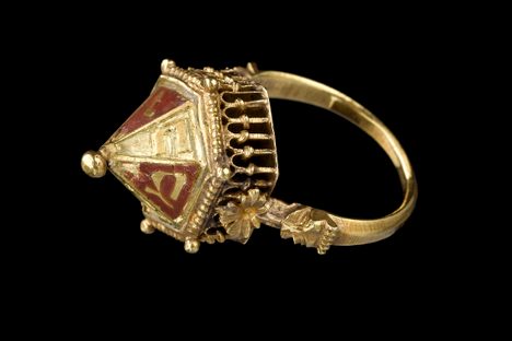 The ceremonial wedding ring found in the wall of a confectionary shop in Alsace. 