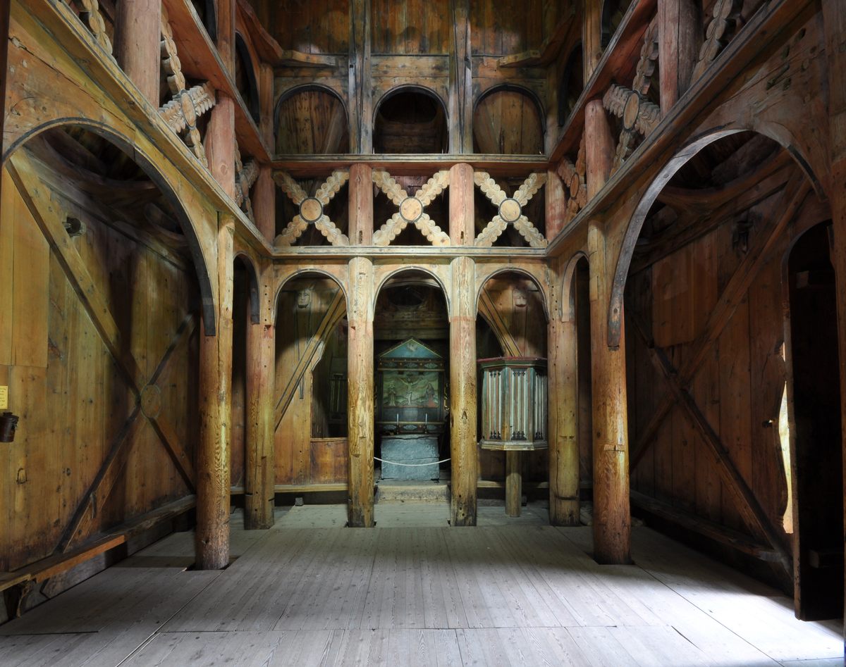The interior of the Borgund stave church is representative of the buildings' unique medieval architecture.