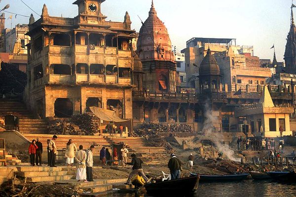 Hindu burning ghats along the banks of the sacred Ganges River in Varanasi.