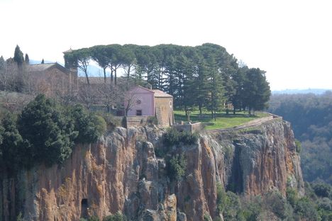 The cliffs by the sanctuary. The entrance to the steps is located behind the trees. 