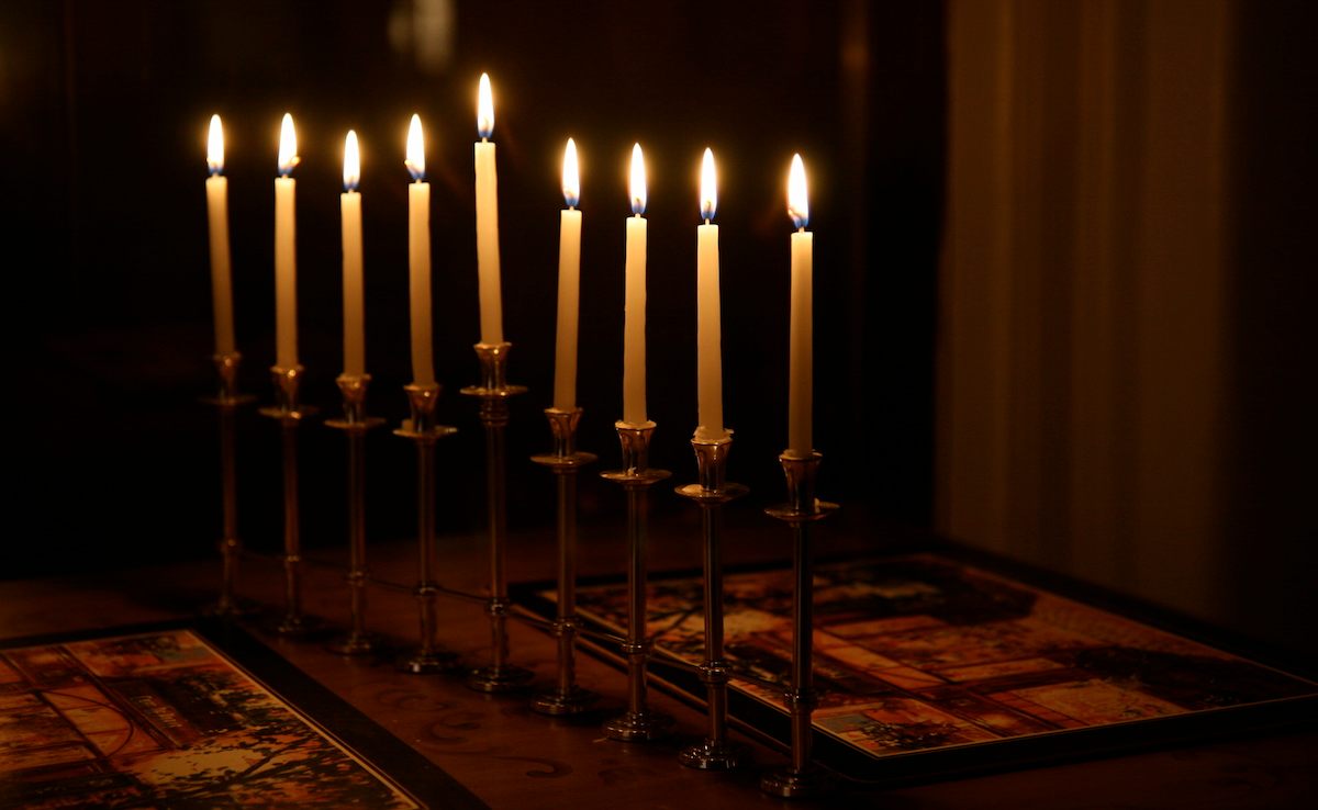 All nine branches of a more traditional menorah, lit on the last night of Hanukkah.