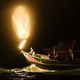 A fire-fishing boat lures sardines to the surface off the coast of Taiwan.
