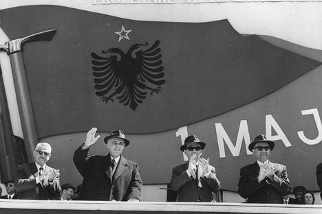 Communist officials from the ruling Albanian Party of Labour including Enver Hoxha, 2nd from left, wave and clap during national celebrations, 1973.