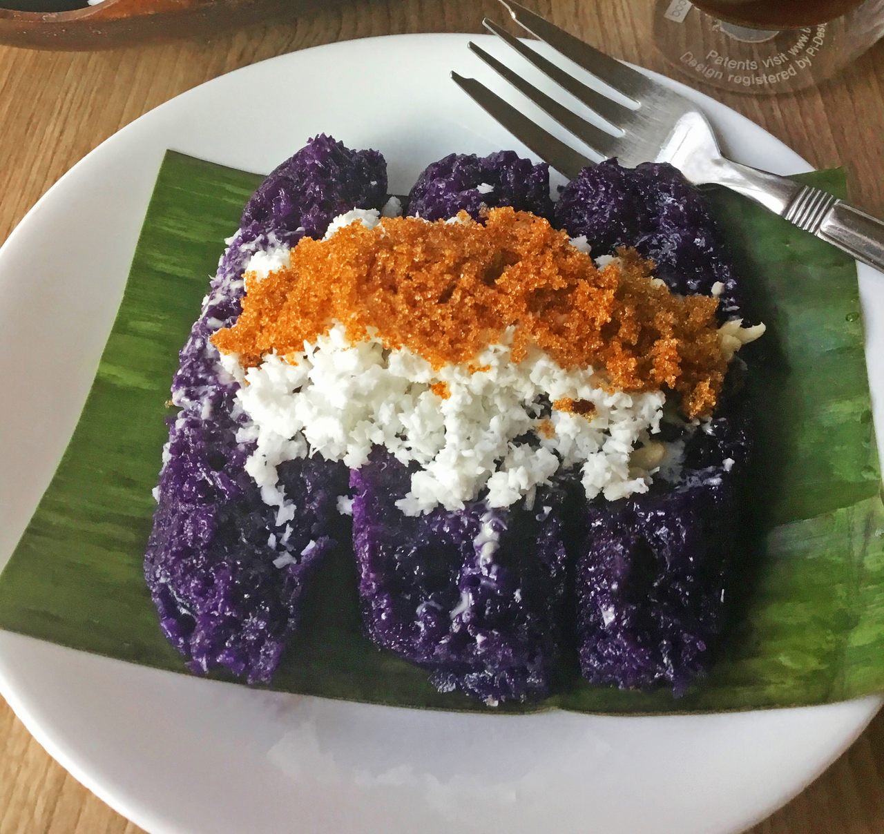 The purple hue traditionally comes from pirurutong rice, but cooks often use ube flavoring for color.