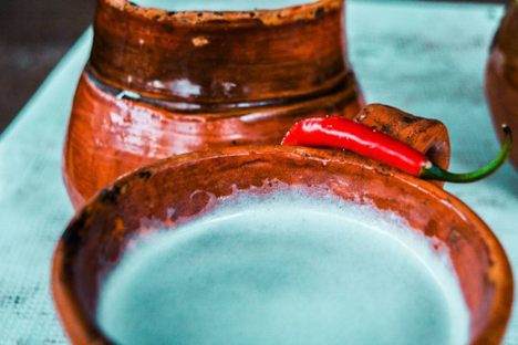 Pitchers of pulque curado.