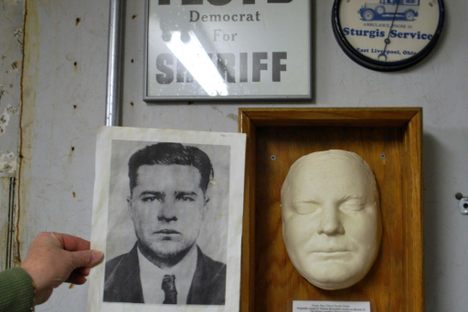 Pretty Boy's notorious mug shot and his death mask.