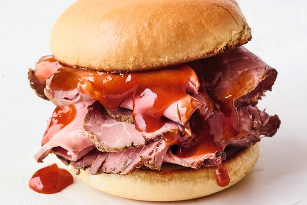 The BBQ beef sandwich comes piled high with thinly sliced meat.