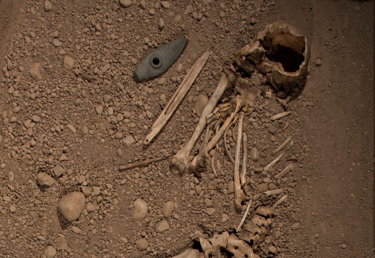 Part of the burial at Bergsgraven, as displayed at the Östergötlands Museum. An ax head is visible at top center. 