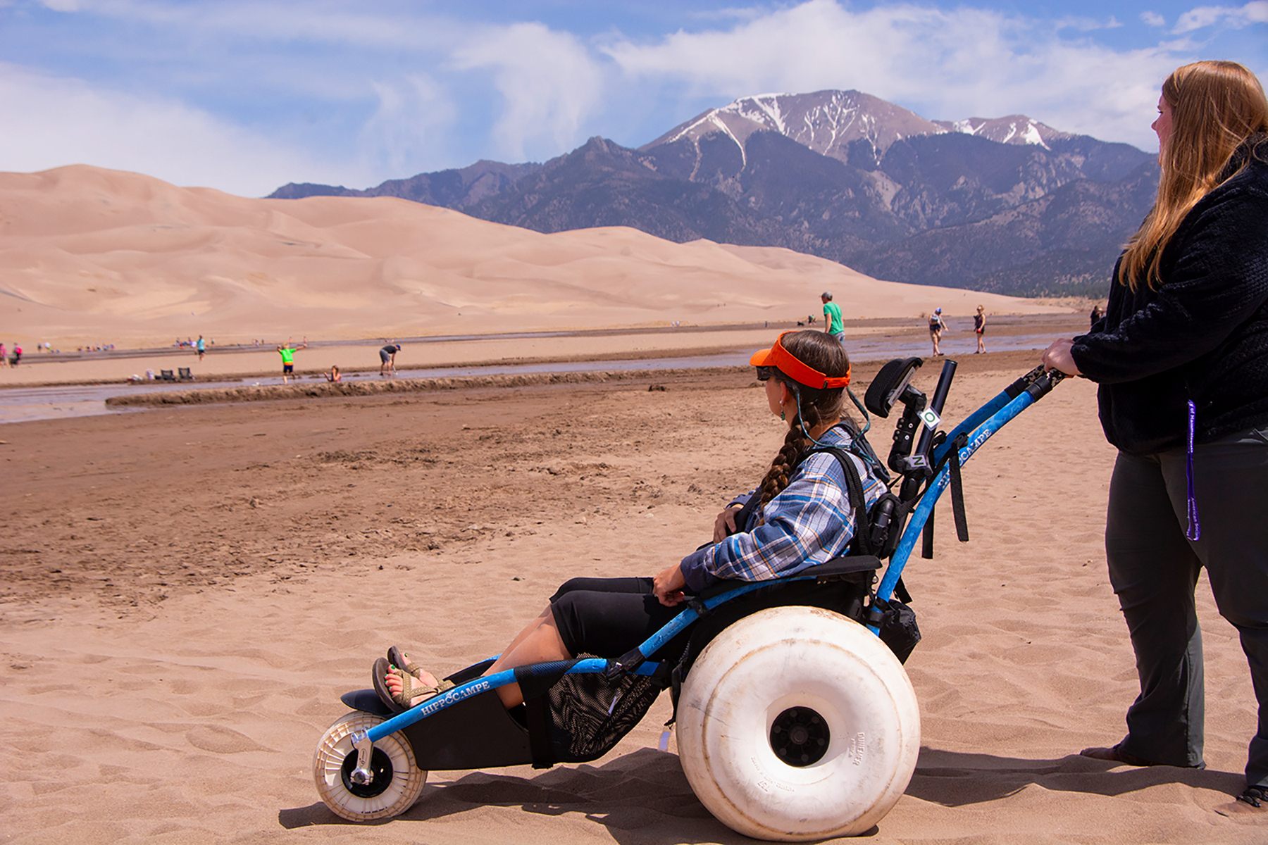 At Great Sand Dunes National Park in Colorado, wheelchair users can borrow free “dune wheelchairs” designed for the park’s terrain.