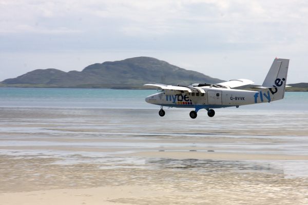Plane landing, Barra Airport.