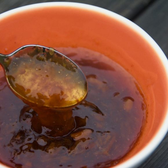 A bowl of monkey gland sauce ready to be spread across red meat, poultry, or fish.
