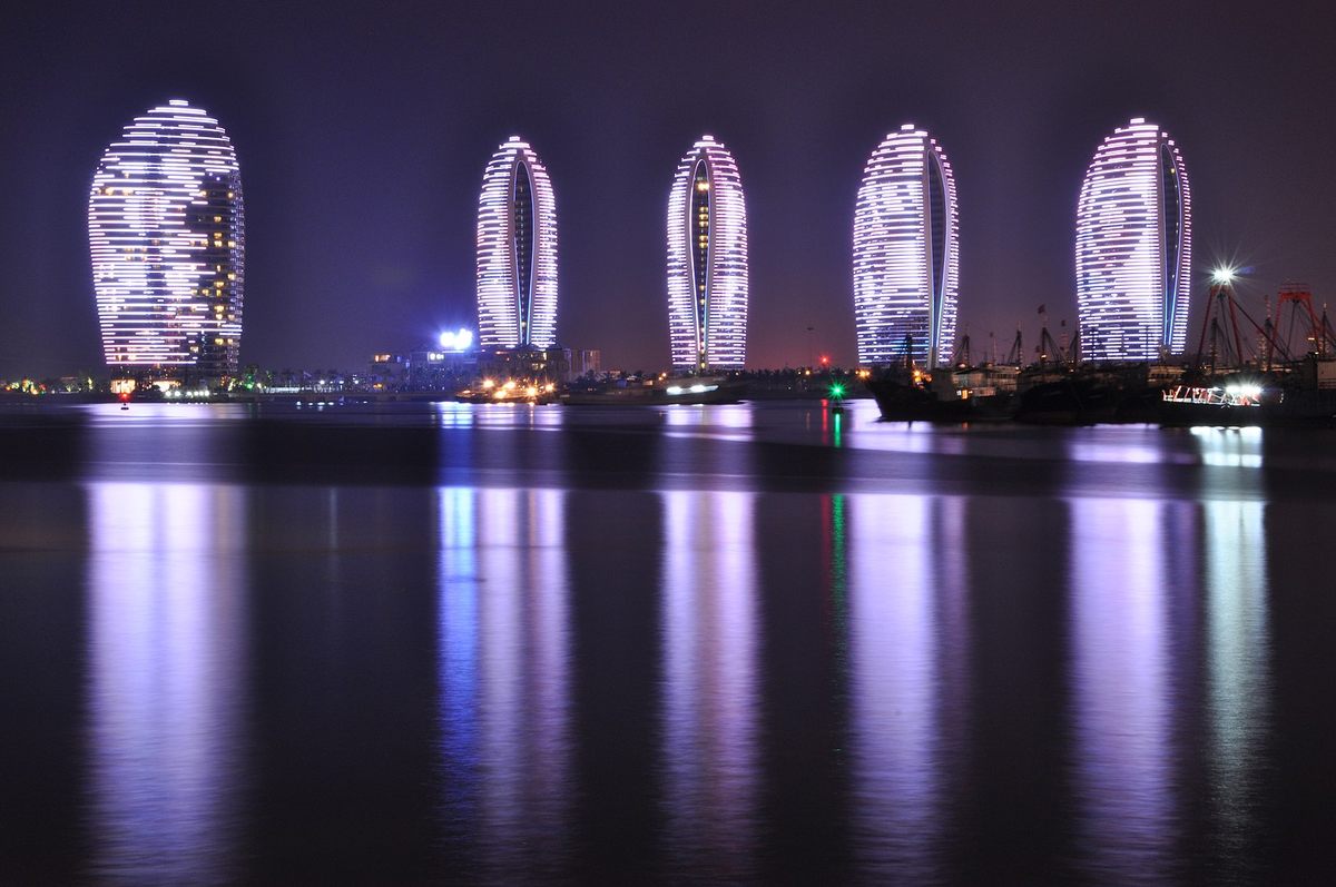 Every night at 7 p.m., the towers of China's Phoenix Island pulse with a dazzling light display.