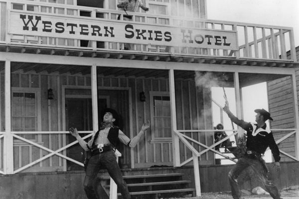 A staged gunfight at Little Beaver Town, 1961.