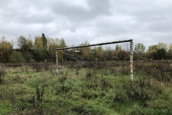 A ghostly goalpost waits for a game that will never happen