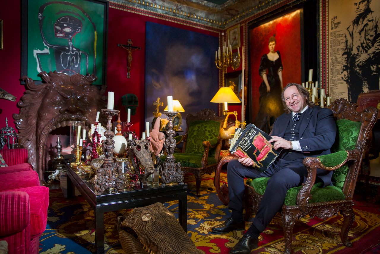 Bill G.B. Pallot, pictured here in his Paris home in 2017, has been at the center of a storm over counterfeit antique furniture. 